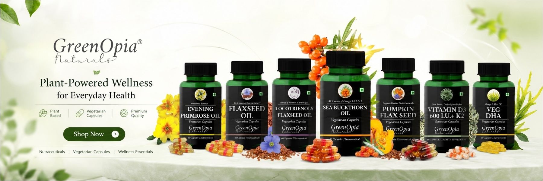 A promotional banner for GreenOpia Naturals showing six herbal supplement bottles lined up on a white surface with botanical and food props. The bottles are dark green with black caps and labeled with product names such as Turmeric Powder, Flaxseed Oil, and Vitamin G.
