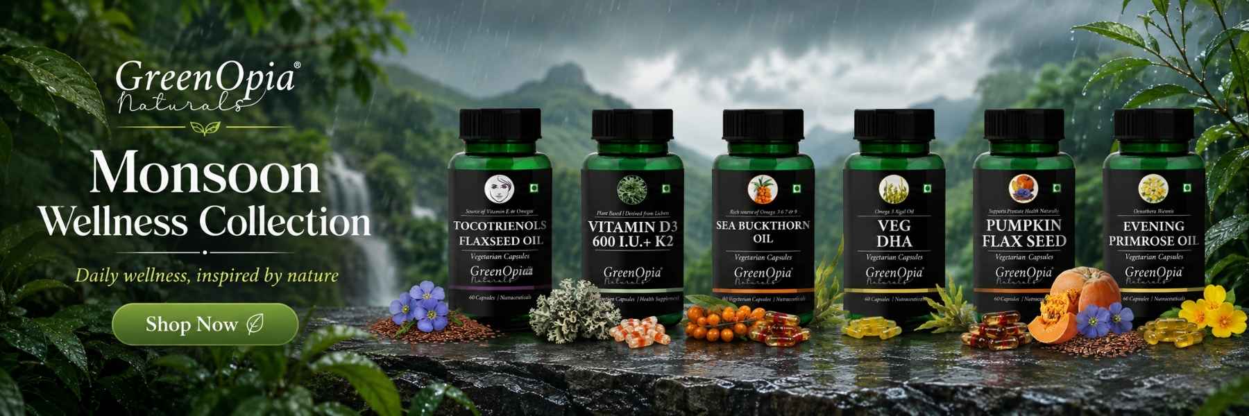 GreenOpia Naturalis Monsoon Wellness Collection featuring six green supplement bottles lined up on a stone surface with tropical rainforest scenery in the background.