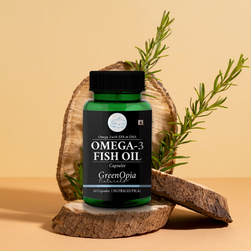 GreenOpia Omega-3 Fish Oil bottle held in hand for size reference
