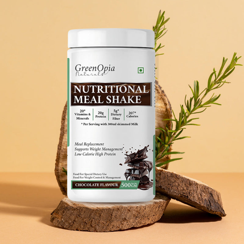 Prepared chocolate meal replacement shake in a glass ready to drink